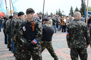 Pro-Russian militants form up for the Donetsk Victory Day parade in May. Their continued existence in the face of Ukraine's Counter-Terror Operation has been ascribed to Russian support in both men and arms. Photo by Andrew Butko via Wikimedia Commons